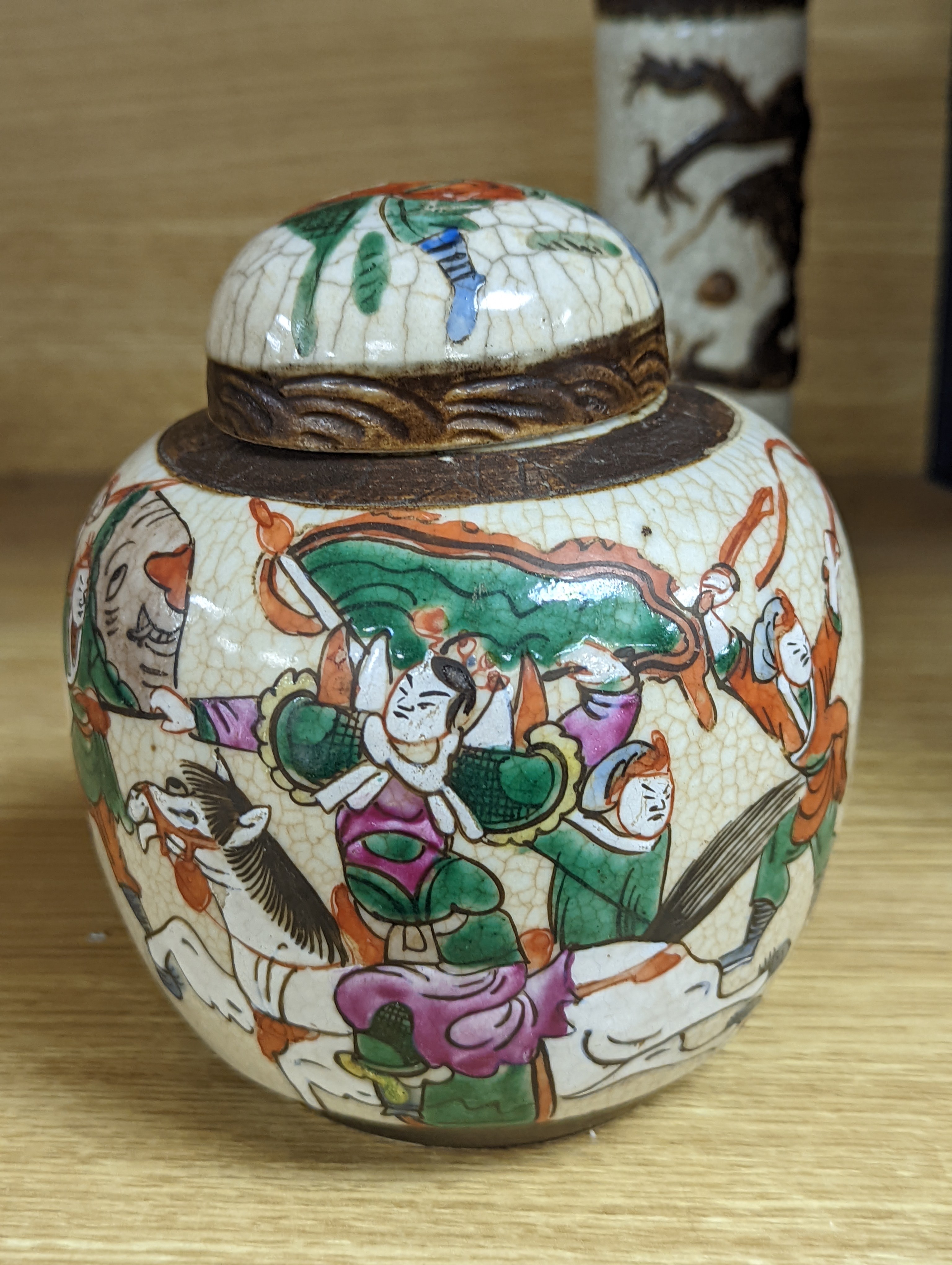 A Chinese famille verte crackle glaze jar and cover, 14.5cm, two famille rose dishes and a crackle glaze ‘dragon’ vase, all late 19th/early 20th century
